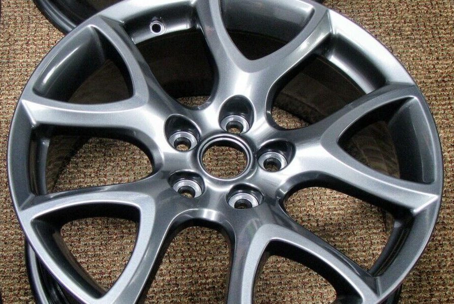 Powder coating automotive wheels